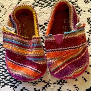 NWOT BABY GIRL MULTI COLORED TOMS SIZE T2 AND RED TOMS 2T BUNDLE OF TWO